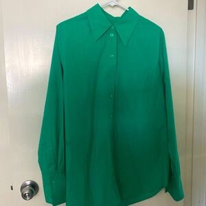 COS oversized tailored green women’s shirt.